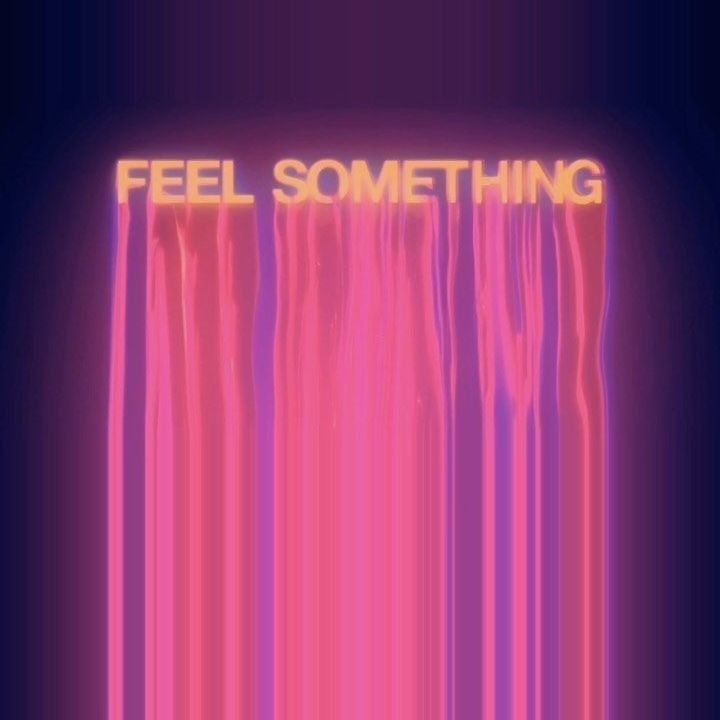 Mixed media artwork with the words feel something